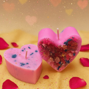 Vela en forma de corazón con piedritas